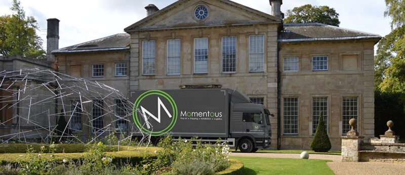 Momentous Transportation outside a house